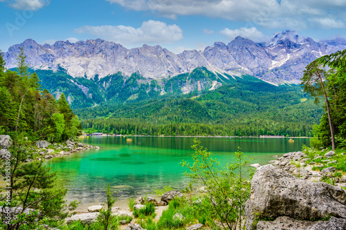 Eibsee lake with Zugspitze mountain in the background. Beautiful landscape scenery with paradise beach and clear blue water in German Alps - Garmisch Partenkirchen  Grainau - Bavaria  Germany  Europe.