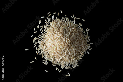 Dry rice isolated on black background.