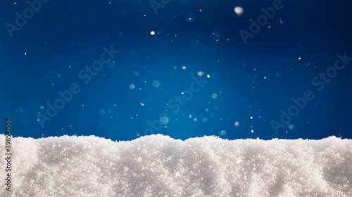 Obraz na plátně A thick layer of snow on blue background