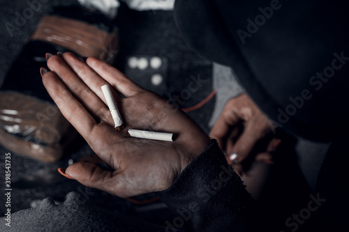 The concept of substance abuse, drug addiction and bad habits. People smoke cigarettes and use drugs. © fusssergei