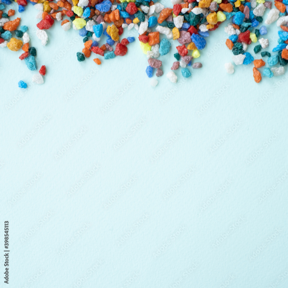 the layout of the background square. empty space for your text. Colored stones. background small stones the layout of the background square. empty space for your text. Colored stones. background small stones