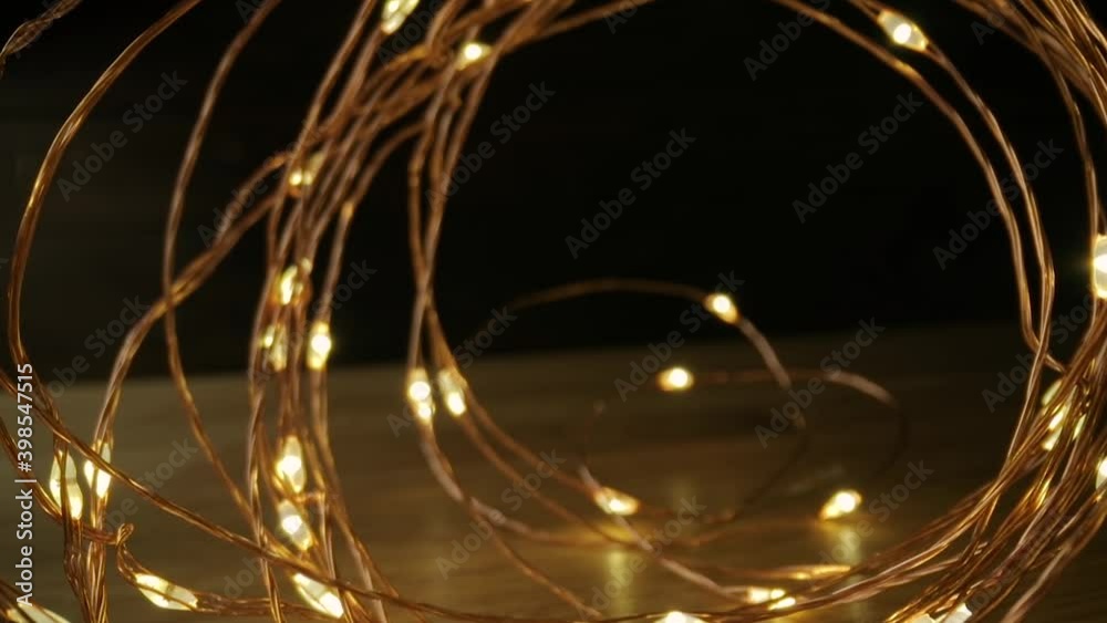 Led fairy lights with probe lens moving through the coil tunnel