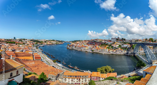 Panoramic view of the old city center of Porto (Oporto), Portugal with the famous Luis I Bridge and the Douro River.