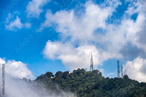Telecommunications towers with blue sky background