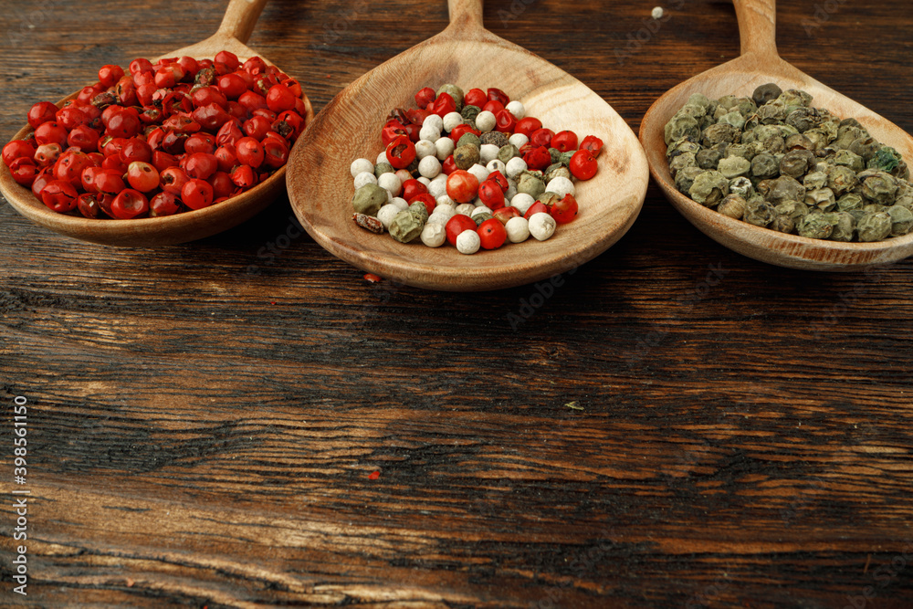 Red, green and white peppercorns spice macro Red, green and white peppercorns spice macro