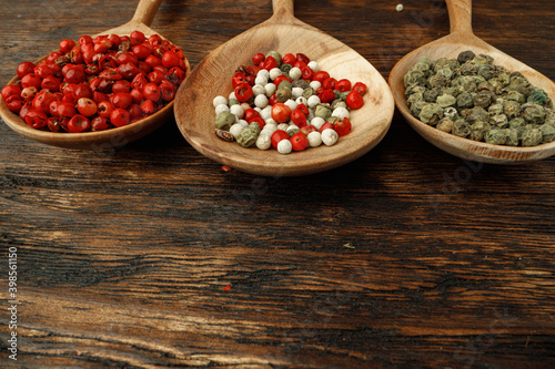 Red, green and white peppercorns spice macro