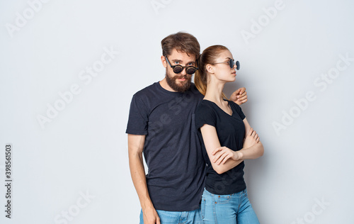 young couple black t-shirts sunglasses studio emotions romance Studio
