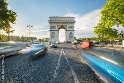 Traffic at the Arc de Triomphe in Paris, France photo