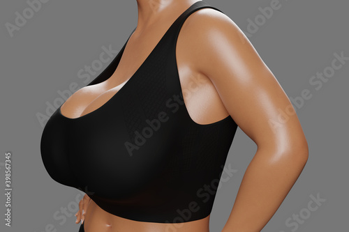 Young slim woman with big breasts in black sportswear