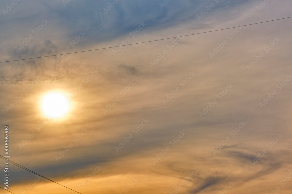 Sun illuminates feather clouds. general plan. day light Sun illuminates feather clouds. general plan. day light