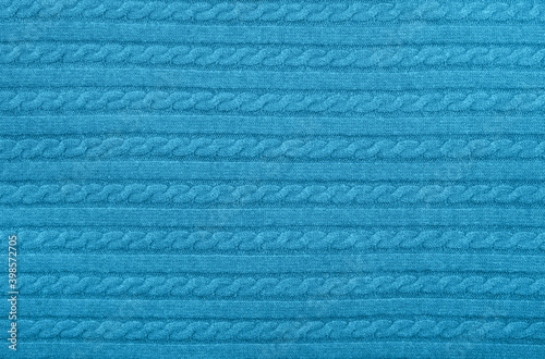 Slika na platnu Background texture of blue knitted wool fabric