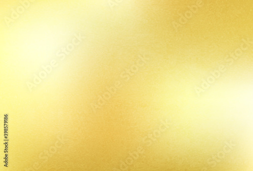 Shiny gold foil texture. Golden background.
