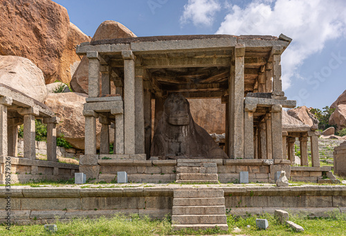 Hampi, Karnataka, India - November 4, 2013: Closeup of Nandi Monolith Statue temple with statue clearly visible.