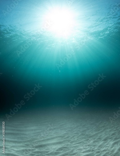 Background of sun beams through clear water