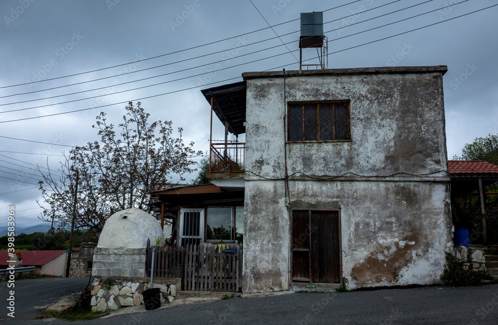 Old buildings in a small village in the mountainous part of the island of Cyprus in early spring.