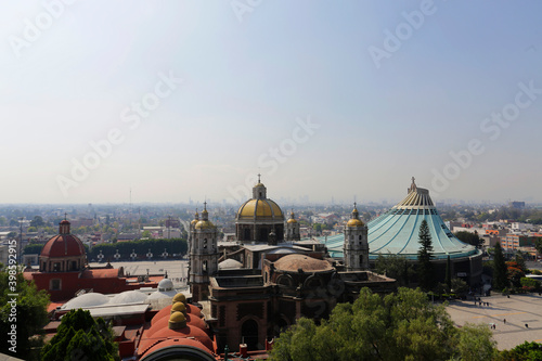 Panoramic view of the old and the new, right, Basilica of the Virgin of Guadalupe in Mexico City, Mexico.