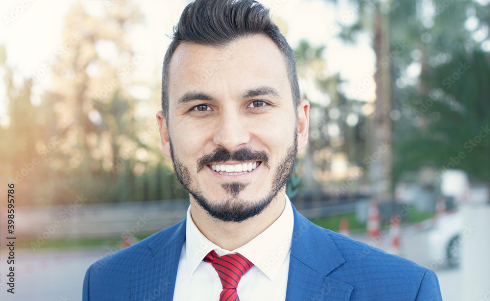Handsome businessman portrait in outdoors. Handsome businessman portrait in outdoors.
