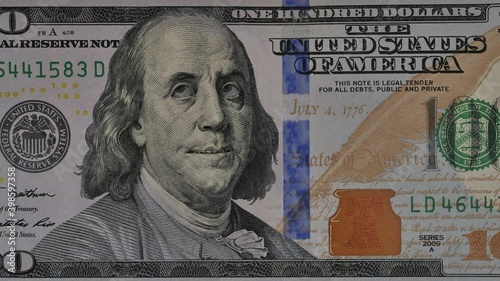 Portrait Of Ben Franklin expressing different emotions to camera. One hundred dollar.
Animation of close-up of US one hundred dollar bill. 