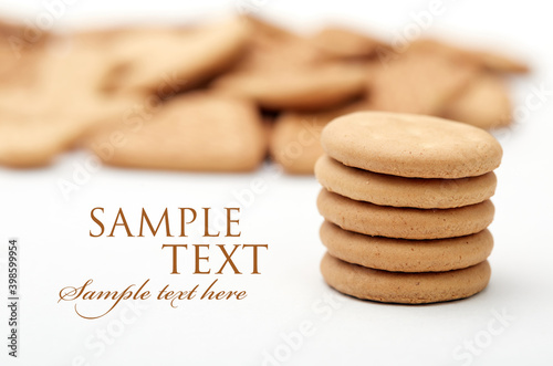 close up of various shaped ginger cookies isolated on a white background