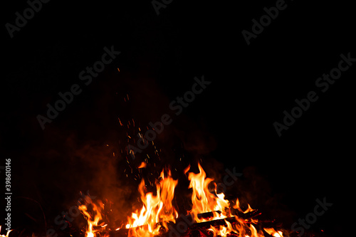 Fire flames on black background. fire burst texture for banner backdrop.