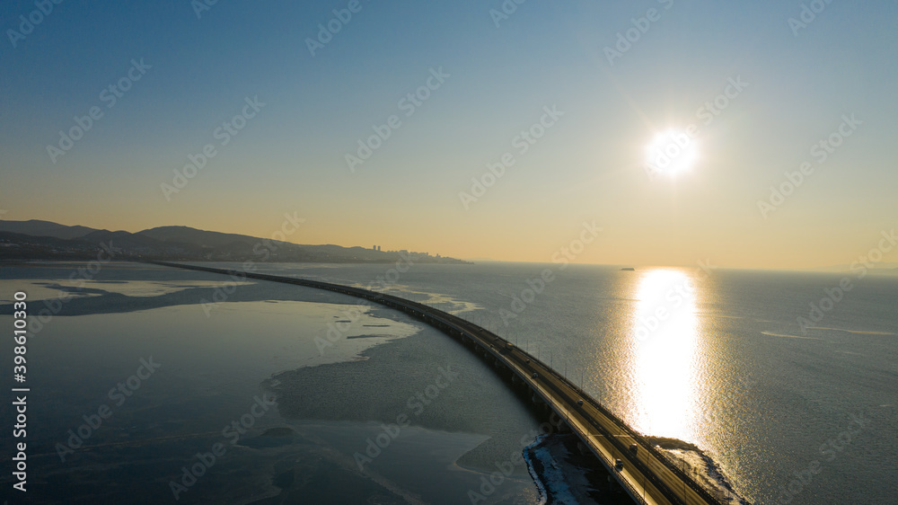 Winter views of The Amur Bay Bridge, photographed on a drone