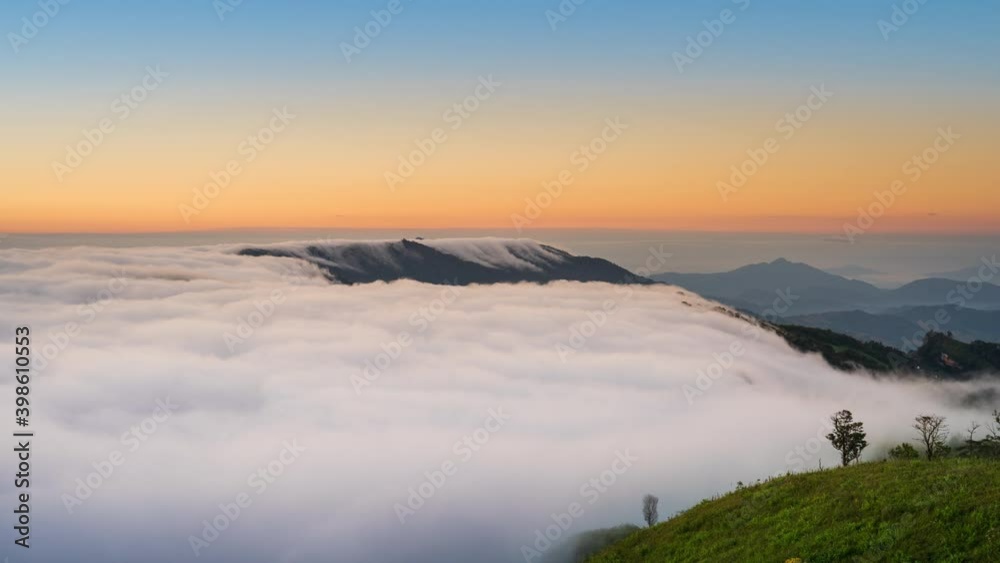 Time lapse of foggy moving over mountains at sunrise. Time lapse of foggy moving over mountains at sunrise.