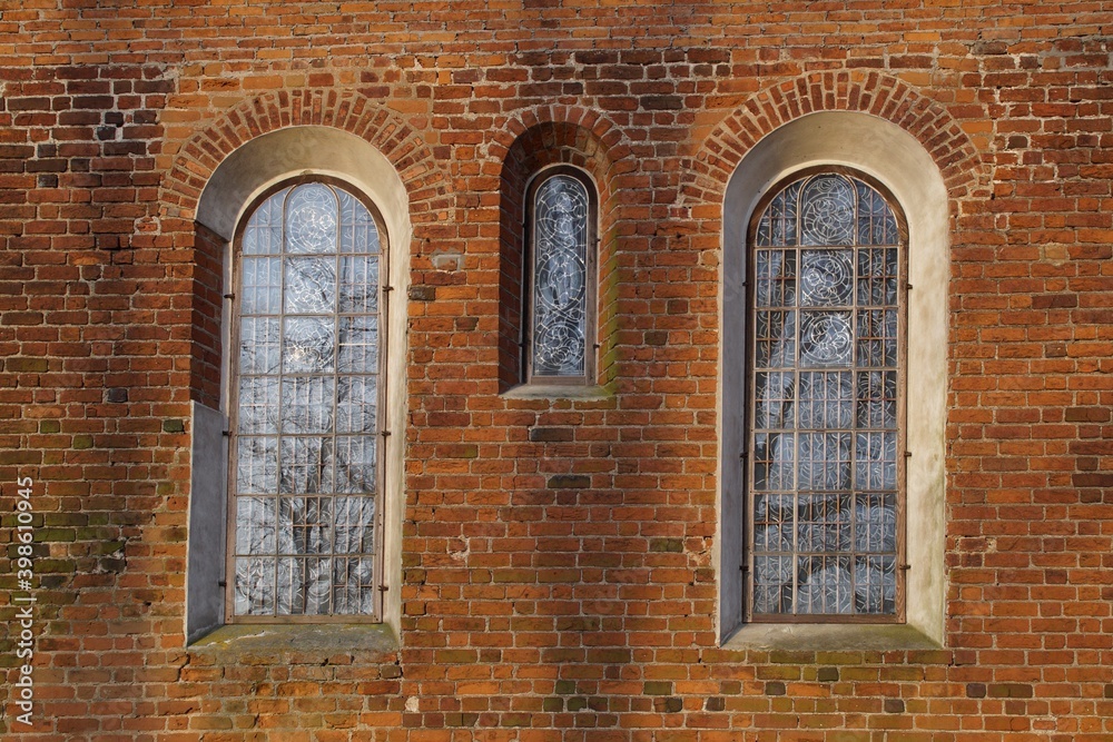 windows in a thirteenth-century Romanesque church in Rokicie, Poland