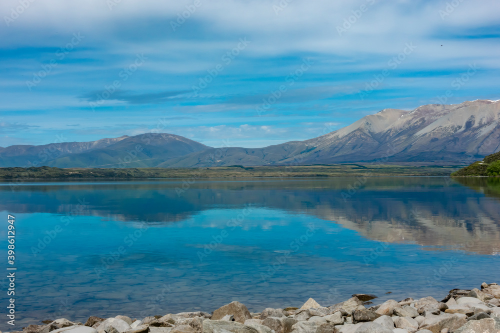 Beautiful lake Ohau  surrounded by mountains.
