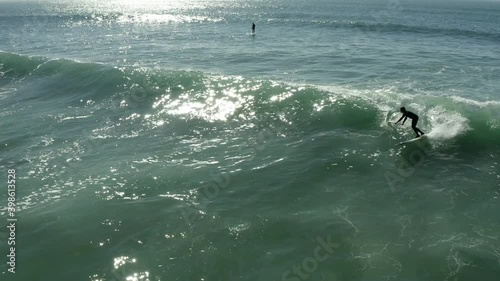4k stand up paddle surf in beautiful Cascais beach in Portugal! Beautiful sunlight!