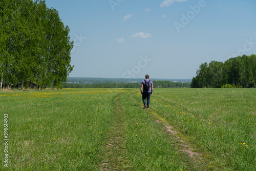A man walks on a rural road © Ernest Vursta