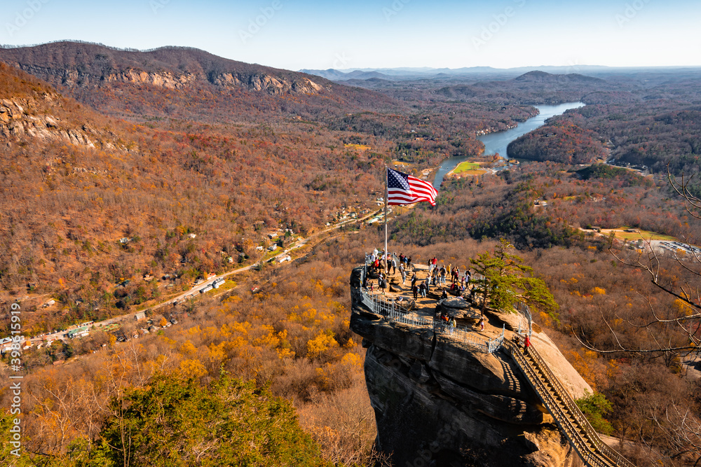Fototapeta premium Chimney Rock at Chimney Rock State Park and Lake Lure, North Carolina,USA in fall season.