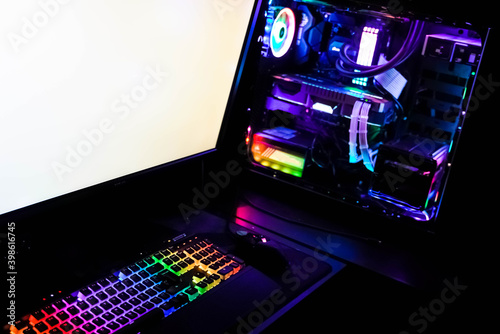 Fototapeta Naklejka Na Ścianę i Meble -  gaming workstation rendering computer with colorful keyboard