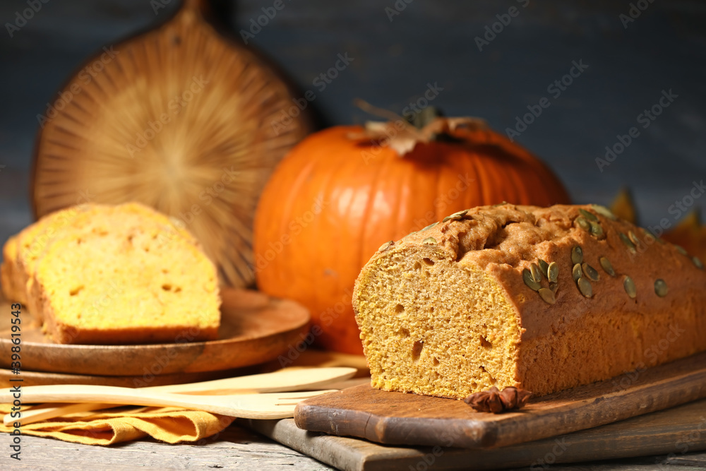 Tasty pumpkin pie on table