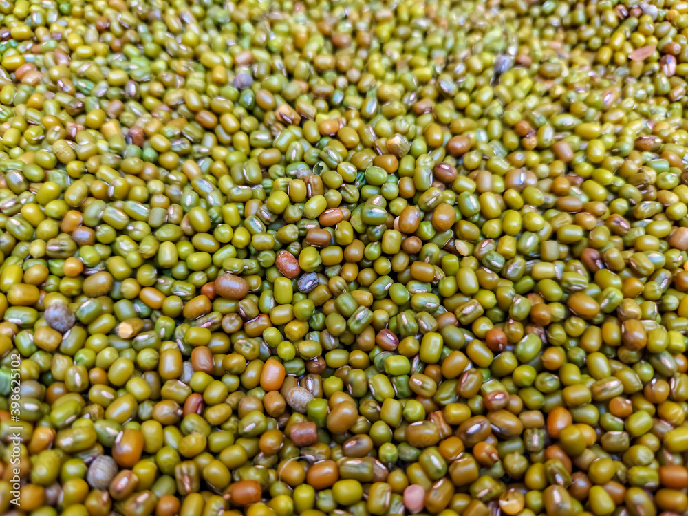 Green and golden colored mung beans close up view Green and golden colored mung beans close up view
