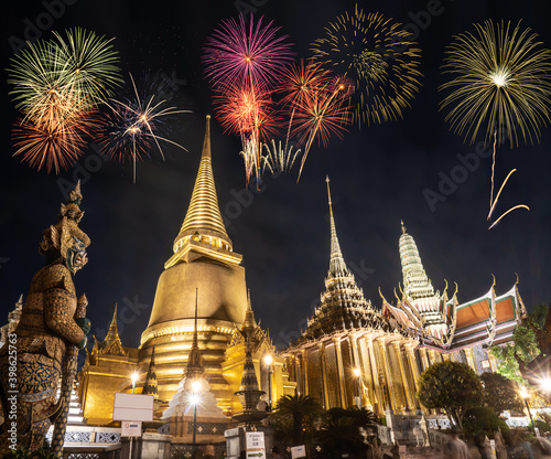 Firework Celebration at Wat Phrasrirattana Sasadaram the Temple of the Emerald Buddha (Wat Phra Kaeo) in night at bangkok, thailand.