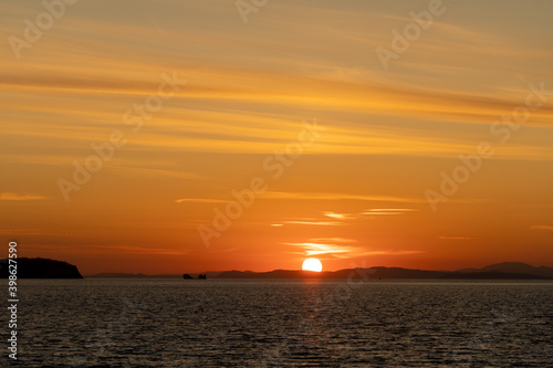 Seascape with a beautiful sunset on the horizon.
