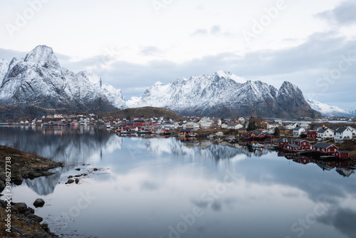 Landscape of dishing house village with mountain view in Lofoten island Reine Norway © magneticmcc