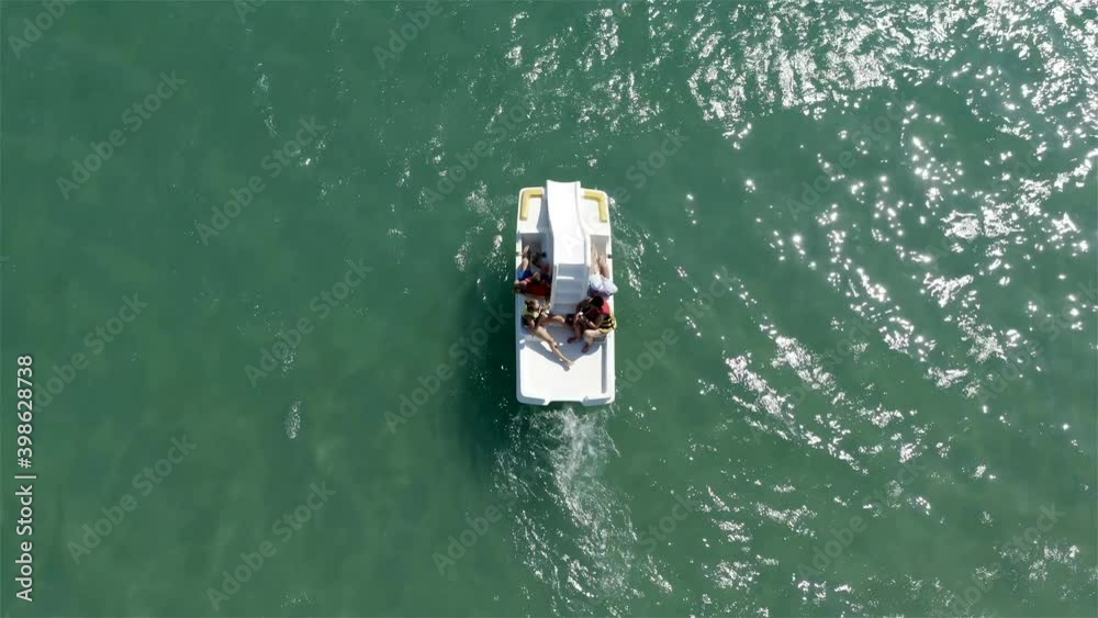 tourists on the sea ride a catamaran. tourists on the sea ride a catamaran.