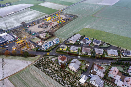 aerial view of houses in the snow  photo