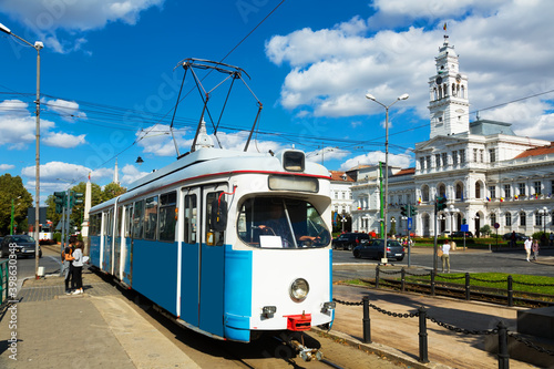 City tram in Arad on town hall square in sunny autumn day, Romania
