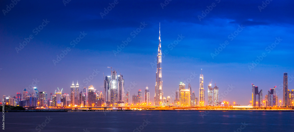 Skyline panorama of Dubai at night, UAE