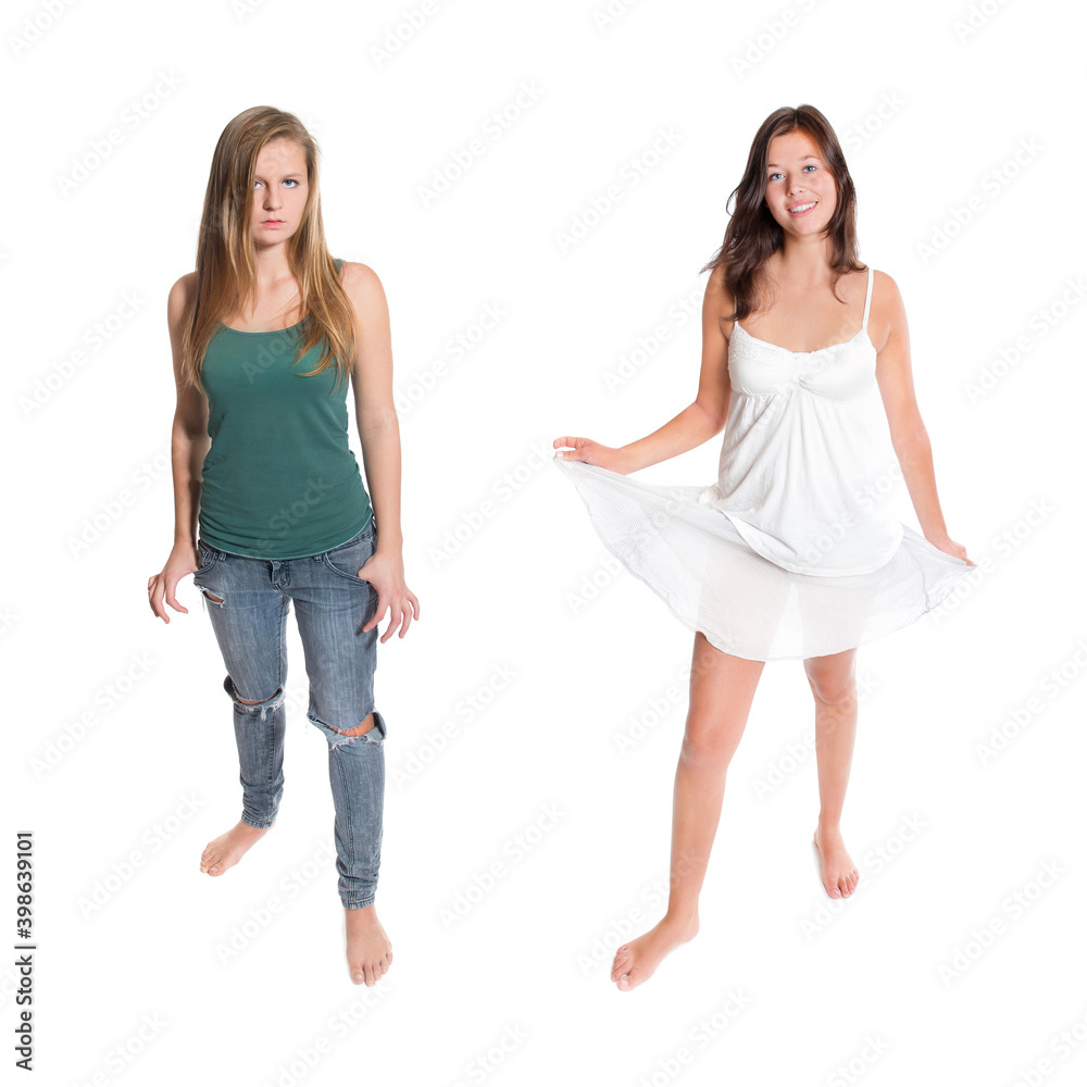 Full length portraits of two beautiful young women wearing casual clothes, isolated on white studio background Full length portraits of two beautiful young women wearing casual clothes, isolated on white studio background
