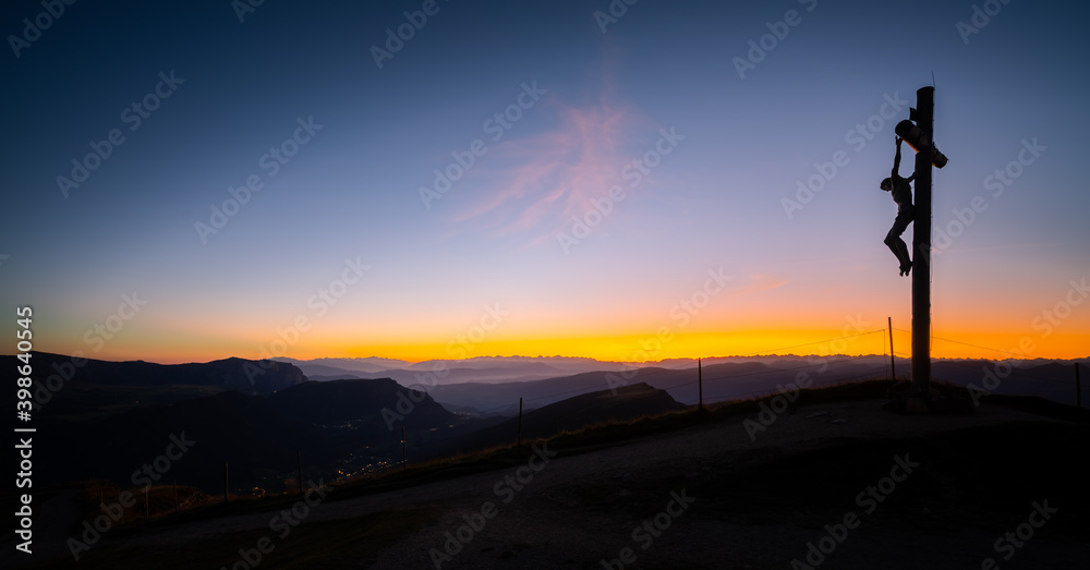 Sunset silhouette of Jesus Christ on the Crosss Sunset silhouette of Jesus Christ on the Crosss