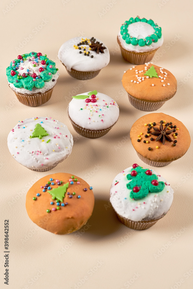 Group of muffins decorated for Christmas, vertical shot Group of muffins decorated for Christmas, vertical shot