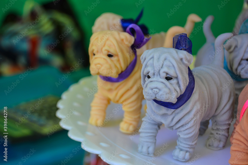 Handmade soap in the form of dogs of breed Sharpey