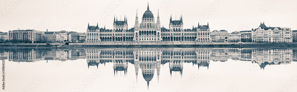 Fototapeta premium Vintage panorama of Hungarian Parliament in Budapest - extra sky space left for text 