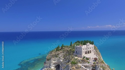 Aerial view of Tropea Sanctuary from drone with city beach in summer season photo