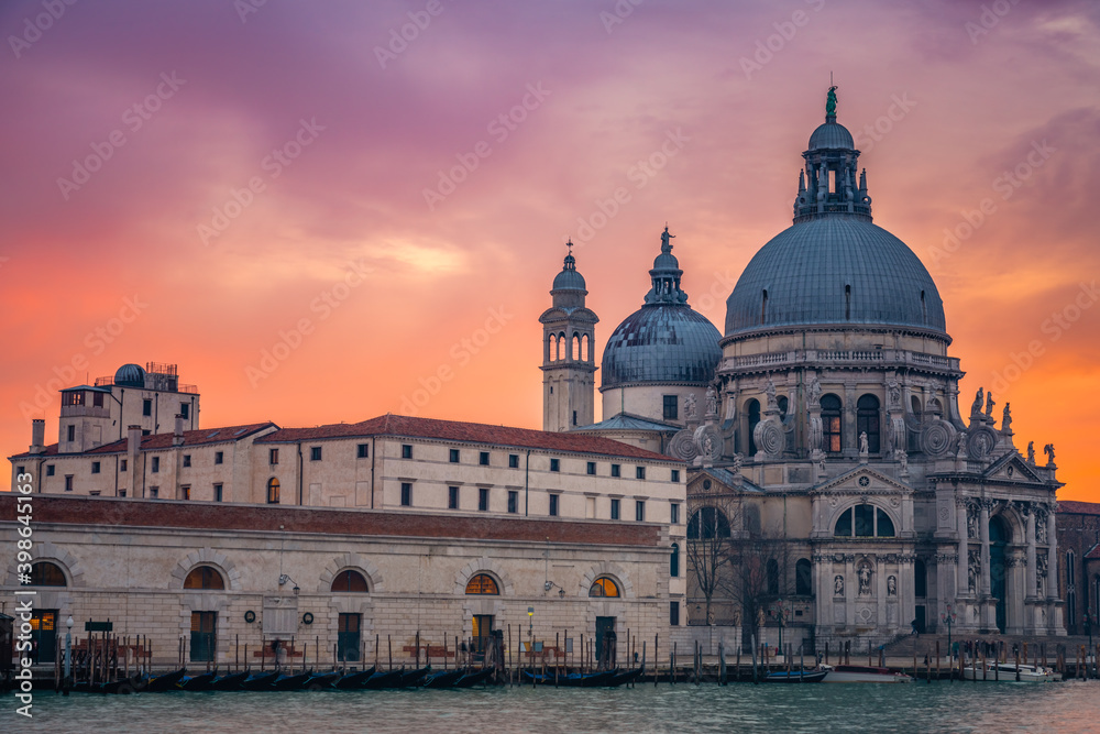 Santa Maria della Salute cathedral at sunset in Venice. Italy
