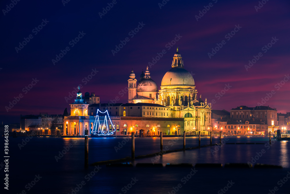Santa Maria della Salute cathedral at dusk in Venice, Italy 