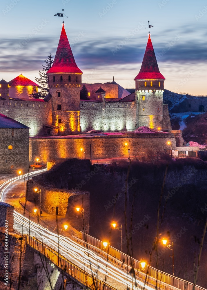 Kamianets-Podilskyi fortress on a winter night